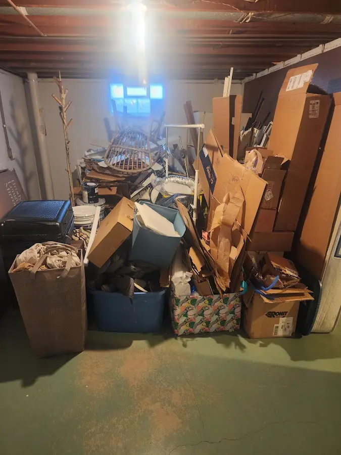 Roll-off dumpster container at job site for 4 Yard Dumpster Rental in Bel Air South